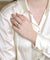 Bague Bague Belle Epoque Péridot entourage diamants 58 Facettes
