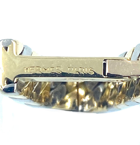 Boutons de manchette HERMÈS. Paire de boutons de manchette 2 ors 58 Facettes