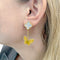 Boucles d'oreilles Boucles d'oreilles Van Cleef & Arpels "Lucky Alhambra" or jaune, nacre blanche, oeil de tigre. 58 Facettes 33555