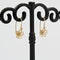 Boucles d'oreilles Fines dormeuses fleurs saphirs blancs 58 Facettes 19-456I