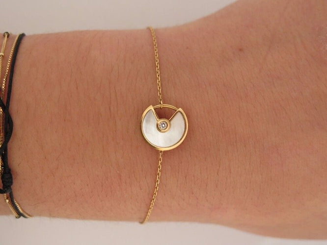 Bracelet bracelet CARTIER amulette nacre xs 15-16 or jaune 18k 58 Facettes 258035