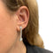Boucles d'oreilles Boucles d'oreilles Art Déco en platine, or, diamants et émeraudes. 58 Facettes 31291