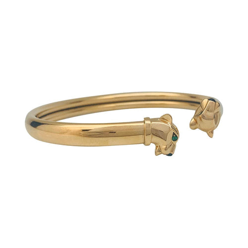 Bracelet Bracelet Cartier "Panthère" en or jaune, tsavorites et onyx. 58 Facettes 31325