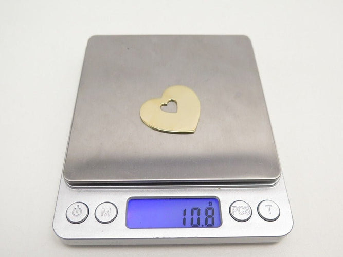 Pendentif pendentif coeur secret POIRAY or jaune 18k sur cordon 10.8gr 58 Facettes 253611
