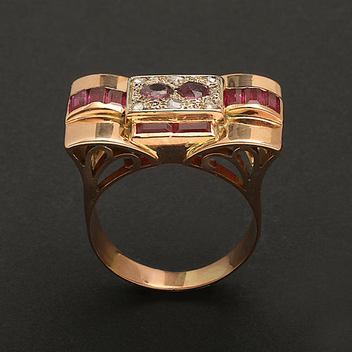 Bague Bague en or jaune, gris, rubis et diamants "Folles années" 58 Facettes 1828