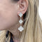 Boucles d'oreilles Boucles d'oreilles Van Cleef & Arpels "Magic Alhambra" or blanc, diamants. 58 Facettes 33549
