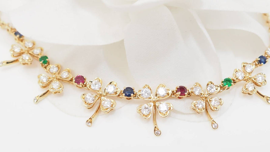 Collier Collier trèfles en or jaune et diamants 58 Facettes 32546