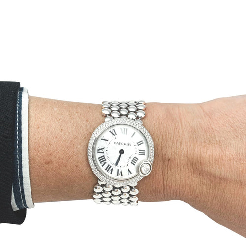 Montre Montre Cartier "Ballon Blanc" en or blanc et diamants. 58 Facettes 31118