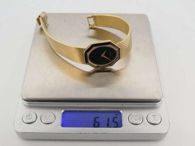 Montre vintage montre PIAGET octogonal onyx 26mm or jaune 18k mecanique 58 Facettes 254507