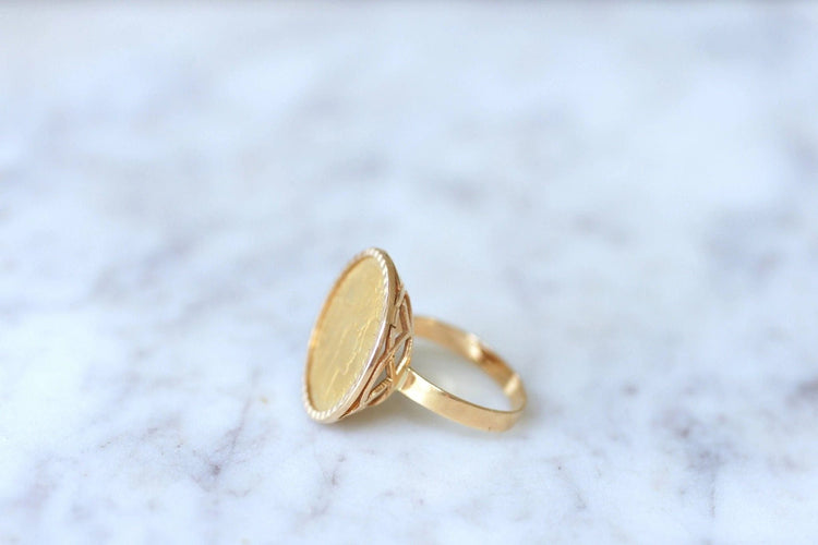 Bague Bague pièce Marianne 10 Francs en or jaune 58 Facettes
