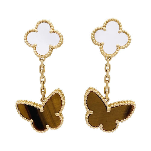 Boucles d'oreilles Boucles d'oreilles Van Cleef & Arpels "Lucky Alhambra" or jaune, nacre blanche, oeil de tigre. 58 Facettes 33555