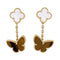 Boucles d'oreilles Boucles d'oreilles Van Cleef & Arpels "Lucky Alhambra" or jaune, nacre blanche, oeil de tigre. 58 Facettes 33555