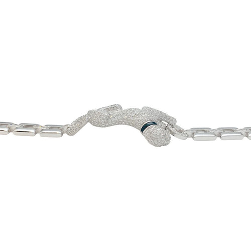 Bracelet Bracelet Cartier "Panthère de Cartier" en or blanc, diamants, émeraude et onyx. 58 Facettes 31544