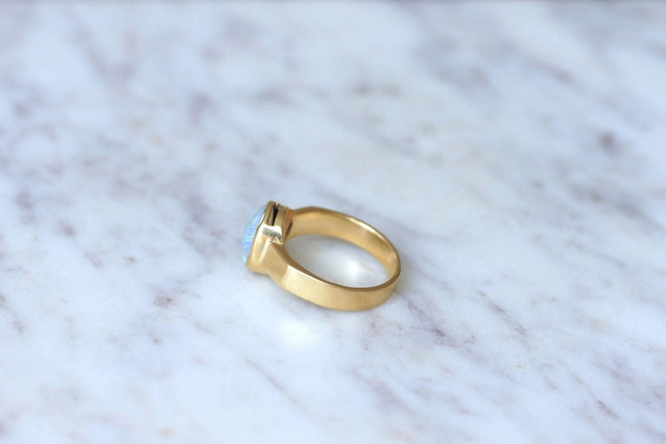 Bague Bague or et opale cabochon 58 Facettes