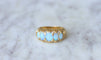 Bague Bague jarretière opales et diamants 58 Facettes