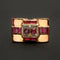 Bague Bague en or jaune, gris, rubis et diamants "Folles années" 58 Facettes 1828