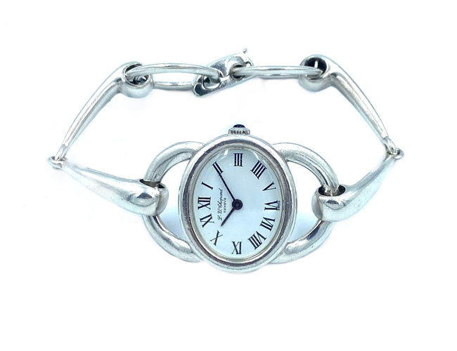 Montre CHOPARD. Montre vintage argent et mouvement mécanique 58 Facettes
