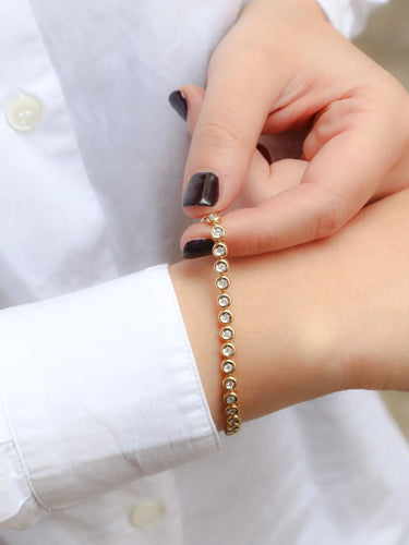 Bracelet Bracelet tennis vintage or jaune et diamants en serti clos 58 Facettes J92