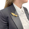 Broche Broche Hermès, "Plume", or jaune, platine, diamants. 58 Facettes 32105