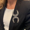 Broche Broche "Fers à Cheval" en platine et diamants. 58 Facettes 31655