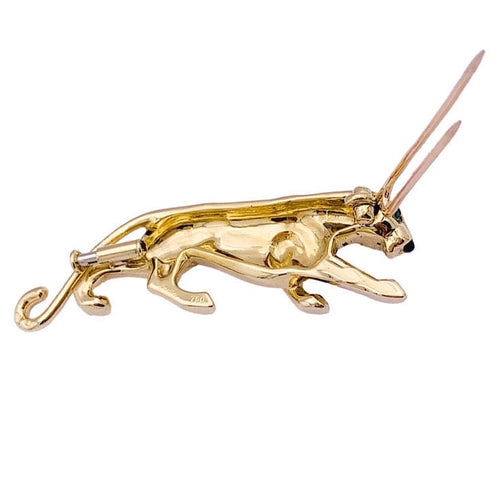 Broche Broche Cartier, "Samantha", or jaune, émeraude et onyx. 58 Facettes 33365