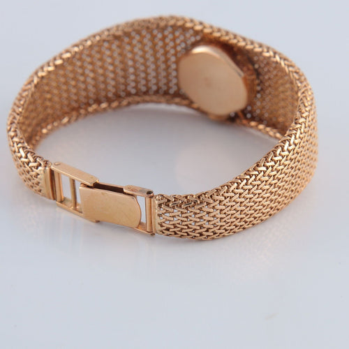Montre Montre en or jaune 58 Facettes