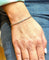 Bracelet Bracelet or blanc boules et barrettes diamants 58 Facettes