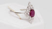 Bague Bague marquise en or blanc, rubis et diamants navette 58 Facettes 29917