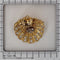Broche Broche coquillage en or, diamants 58 Facettes 23046-0125
