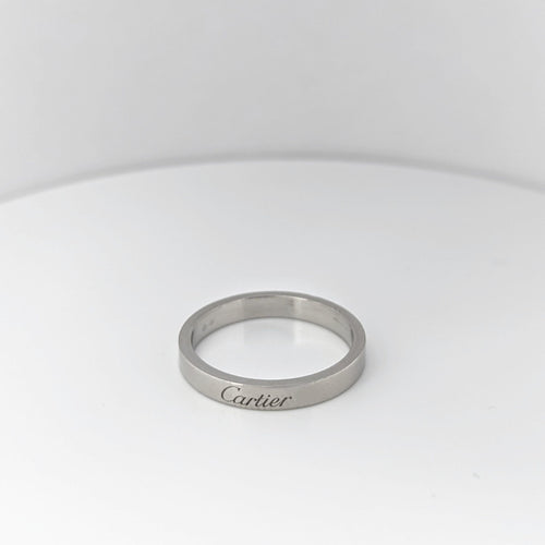 Bague Alliance C de Cartier en platine 58 Facettes 24331