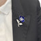 Broche Clip Boucheron, "Eglantine", en or blanc, platine, émail et diamants. 58 Facettes 33342