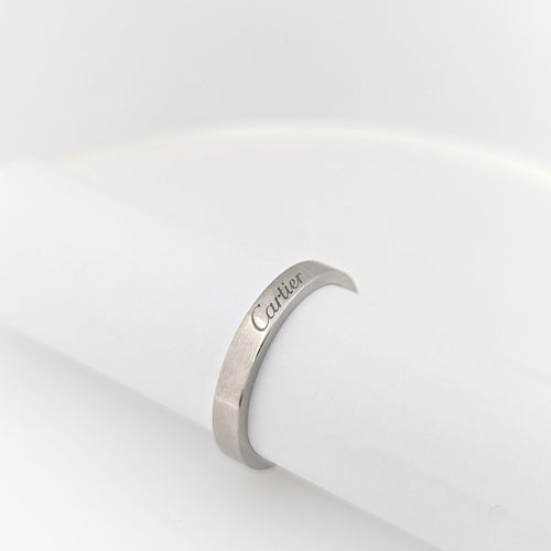 Bague Alliance C de Cartier en platine 58 Facettes 24331