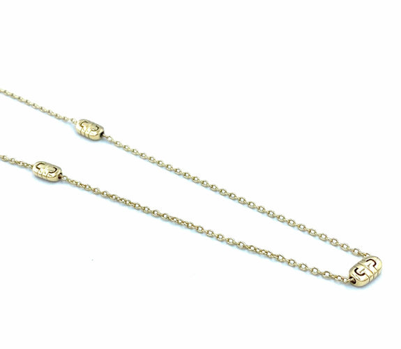 Collier BVLGARI. Sautoir Parentesi or jaune 18K 58 Facettes