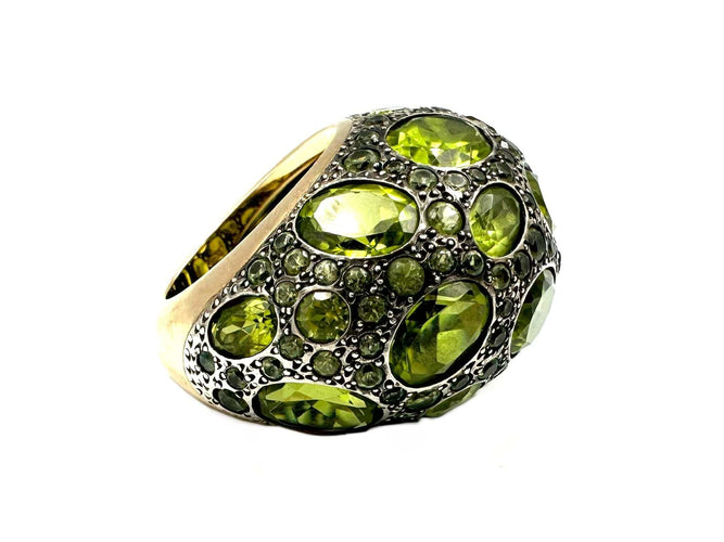 Bague 51 POMELLATO. Collection Tabou, bague or et argent ornée de péridots 58 Facettes