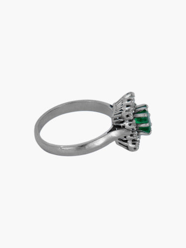 Bague 56 Bague or blanc, diamants et émeraude 58 Facettes