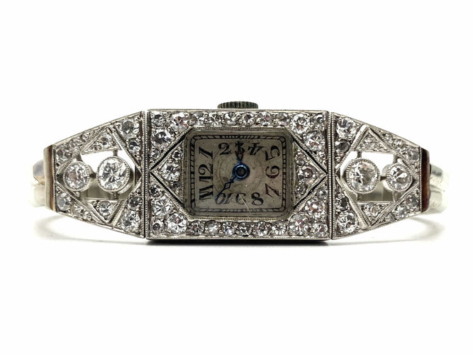 Montre Montre Art Déco platine & or blanc, diamants 2.44 cts 58 Facettes 07/07 - 16