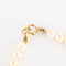 Bracelet Bracelet perles blanches et or jaune 58 Facettes P4L8