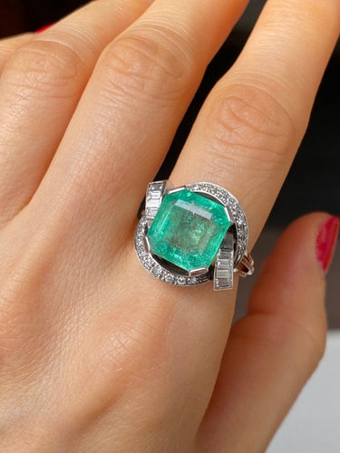 Bague 55 Bague en or blanc 18k sertie d’une émeraude et diamants 58 Facettes