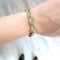 Bracelet Bracelet Vintage Tressé trois ors 58 Facettes 3595