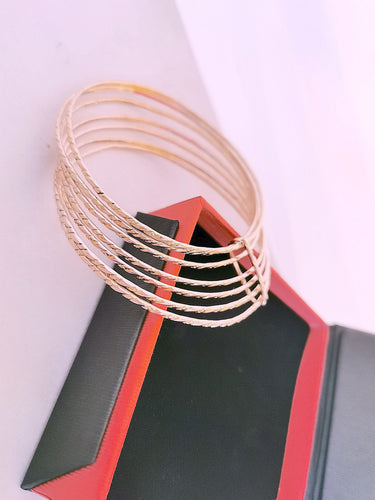Bracelet Bracelet Semainier Joncs ciselés Or Rose 58 Facettes AA 1477