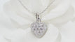 Collier Collier Cartier pendentif cœur, or blanc et diamants 58 Facettes 13807