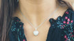 Collier Collier pendentif cœur en or blanc & diamants 58 Facettes 29969