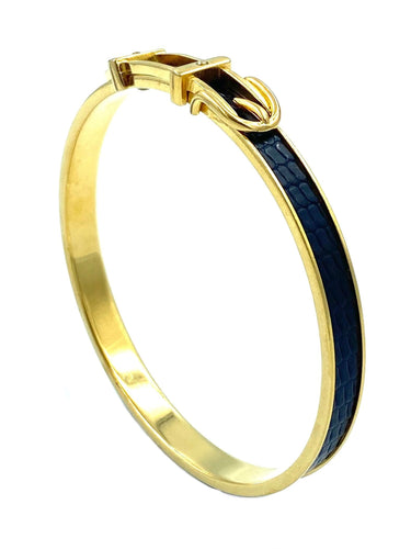 Bracelet Hermès. Bracelet jonc métal doré et cuir 58 Facettes