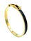 Bracelet Hermès. Bracelet jonc métal doré et cuir 58 Facettes