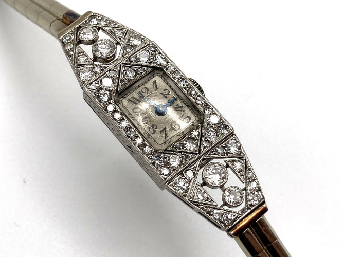 Montre Montre Art Déco platine & or blanc, diamants 2.44 cts 58 Facettes 07/07 - 16