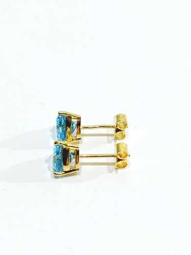 Boucles d'oreilles Paire de boucles d'oreilles or et topaze bleue 58 Facettes