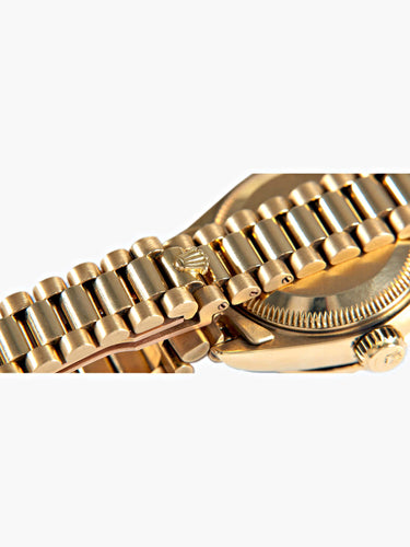 Montre Montre Rolex Président or jaune, diamants et rubis 58 Facettes