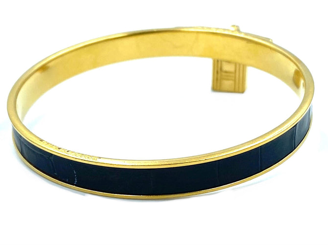 Bracelet Hermès. Bracelet Kelly métal doré et cuir 58 Facettes