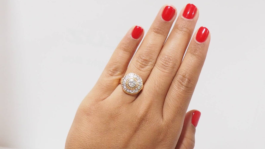 Bague Bague Rétro entourage or bicolore diamants 58 Facettes 30851