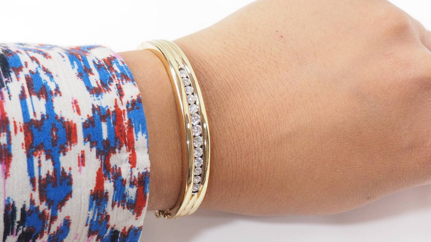 Bracelet Bracelet jonc ouvrant en or jaune et diamants 58 Facettes 32150